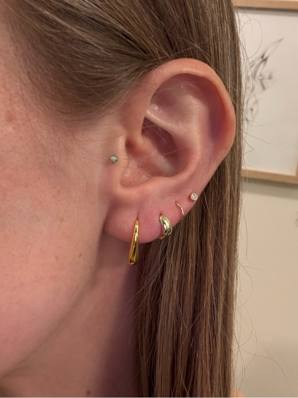 Sterling Silver Stud Earrings gold hanging open